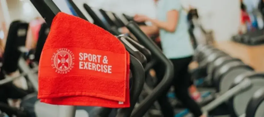 A towel hanging on an exercise bike