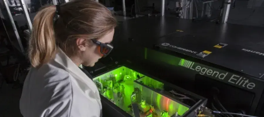 A student using a laser