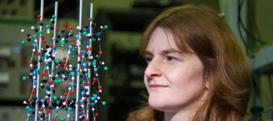An academic looking at a molecule