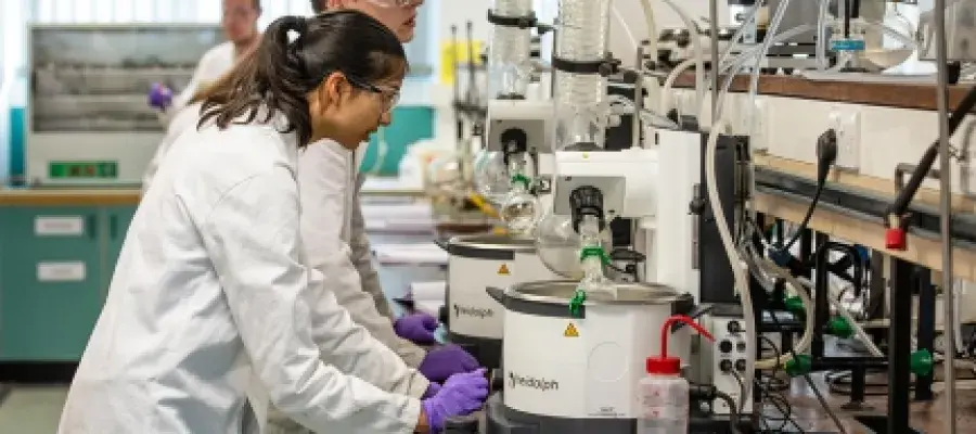 Students using instruments in a lab