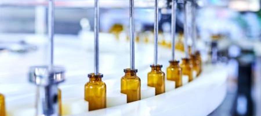 Bottles being filled on production line