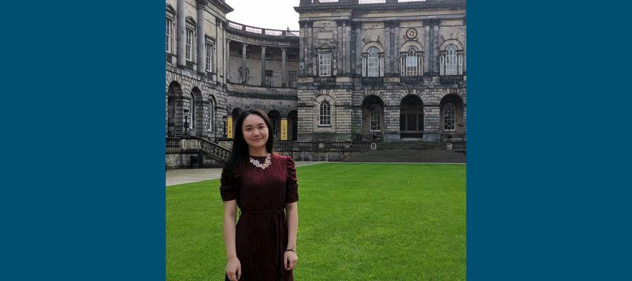 Photo of alumna Yi He at Old College