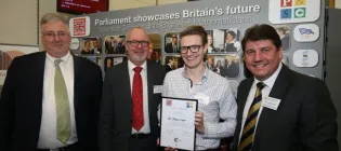 James receiving his prize.