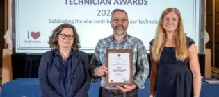 David receiving his award 2024