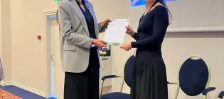 Lisa Kennedy accepting her prize