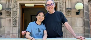 Neil and Chunchun in front of the School of Chemistry