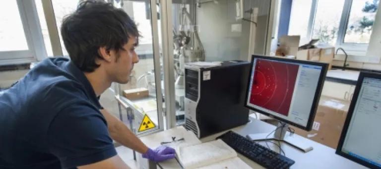 A student using a computer in a lab