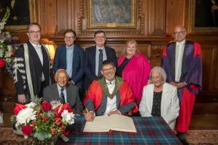 Group photo of Bissell family and University colleagues