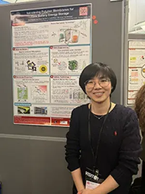 ChunChun posing with poster