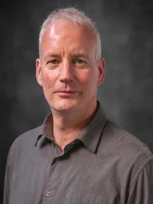 Headshot of Neil Robertson