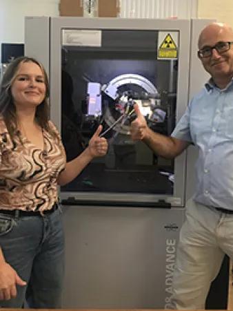 Hannah and Colin with machine